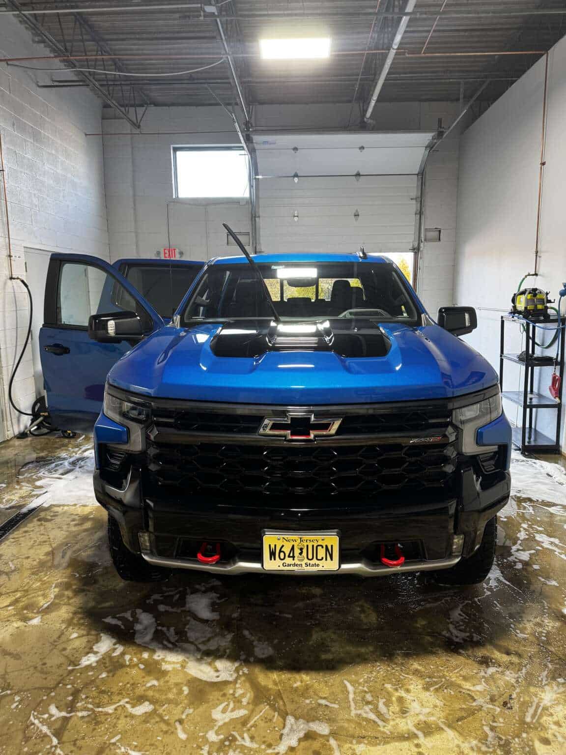 Exterior Car Detailing Near Me: Blue Pickup Truck Being Foam Washed By Hand At Precision Auto Spa In Fairfield Nj