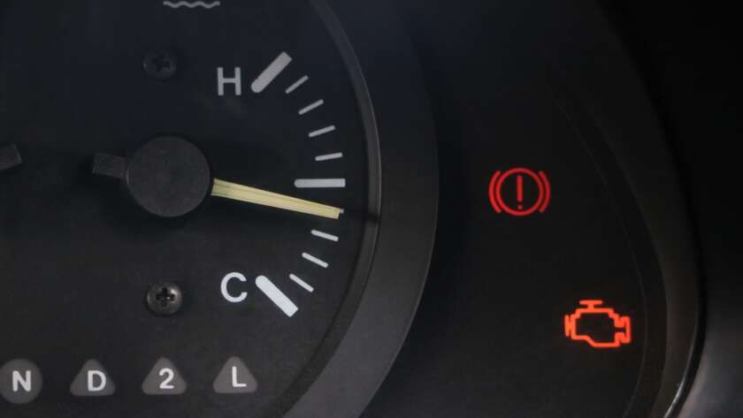 Check Engine Light Illuminated On A Car Dashboard, An Automatic Nj Car Inspection Failure