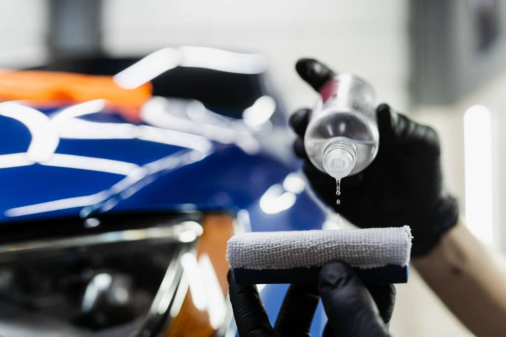 Does Ceramic Coating Work? 7 Honest Truths for NJ Drivers 2 Detailer Prepping A Ceramic Coating Applicator Pad For Ceramic Coating Nj In Fairfield