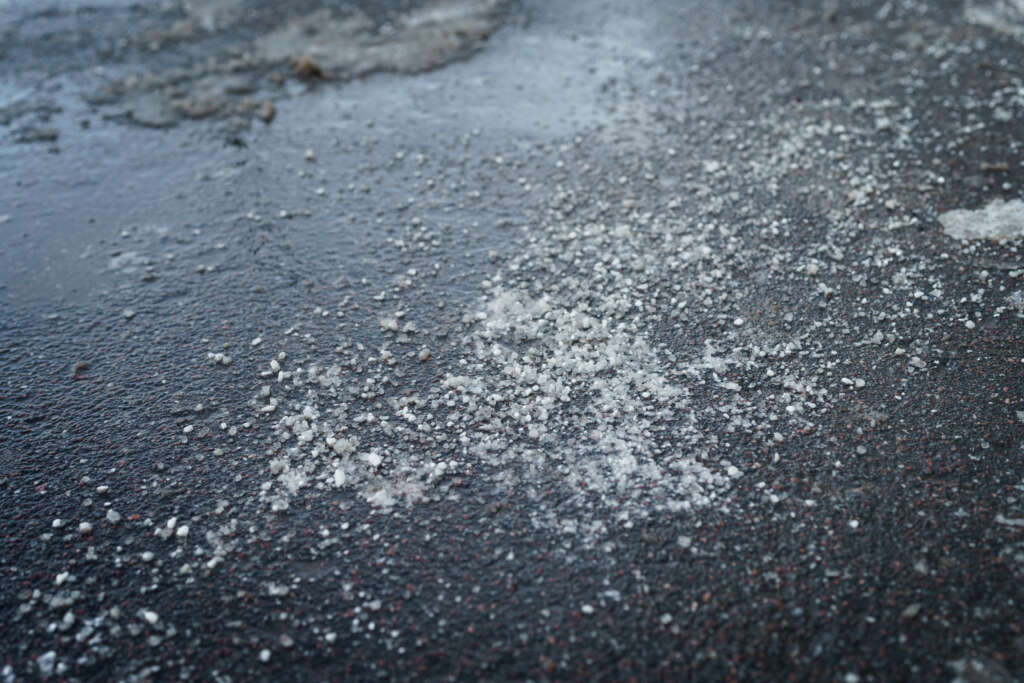 Does Ceramic Coating Work? 7 Honest Truths for NJ Drivers 1 Does Ceramic Coating Work Against Road Salt – Salt And Brine Covering A New Jersey Road In Winter